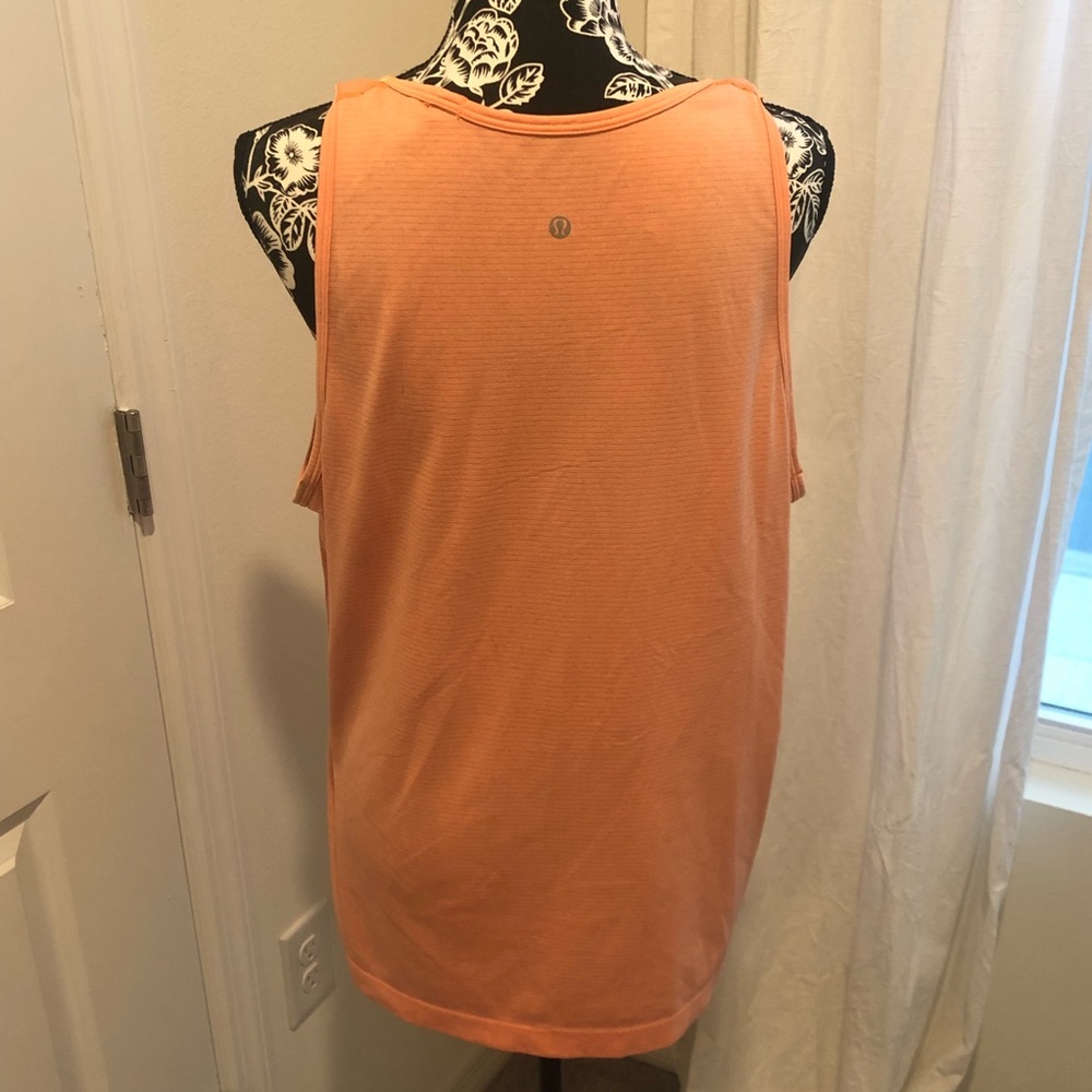 Men’s orange Lululemon tank size large